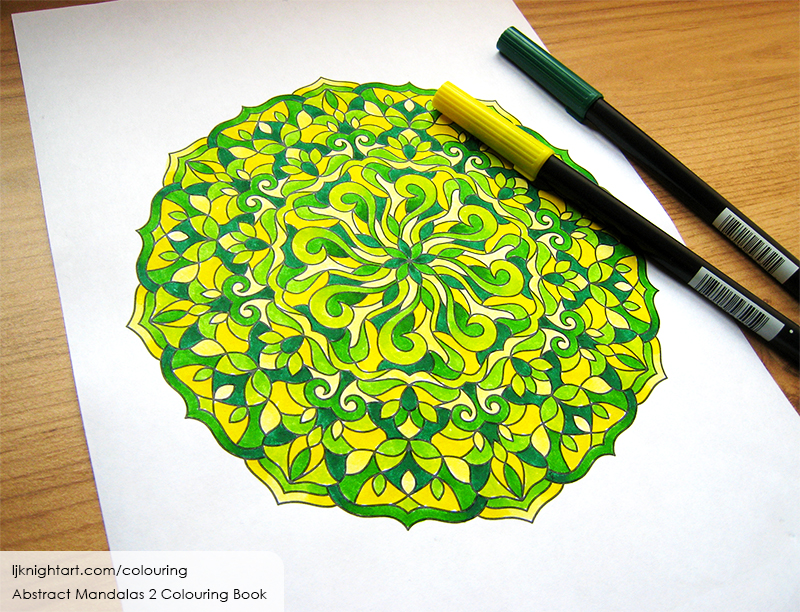 Coloured mandala colouring page for adults in green & yellow