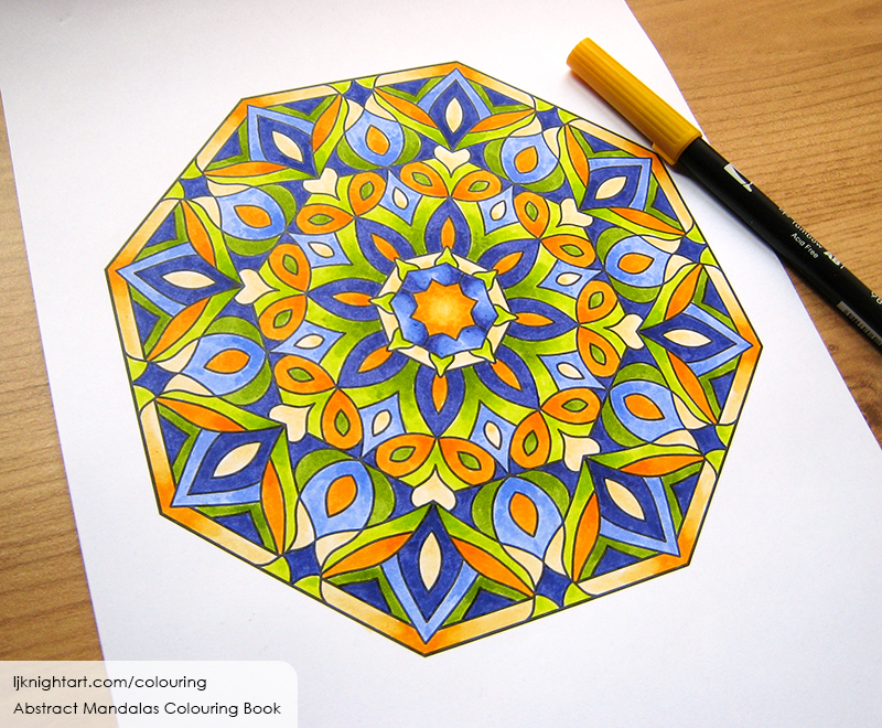 Blue and orange mandala colouring page