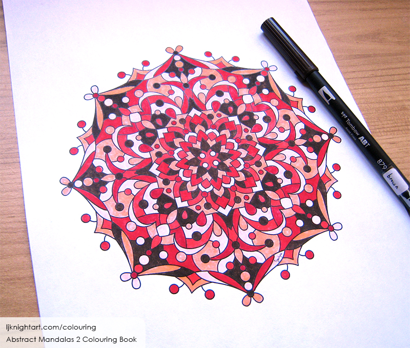 Coloured mandala colouring page for adults