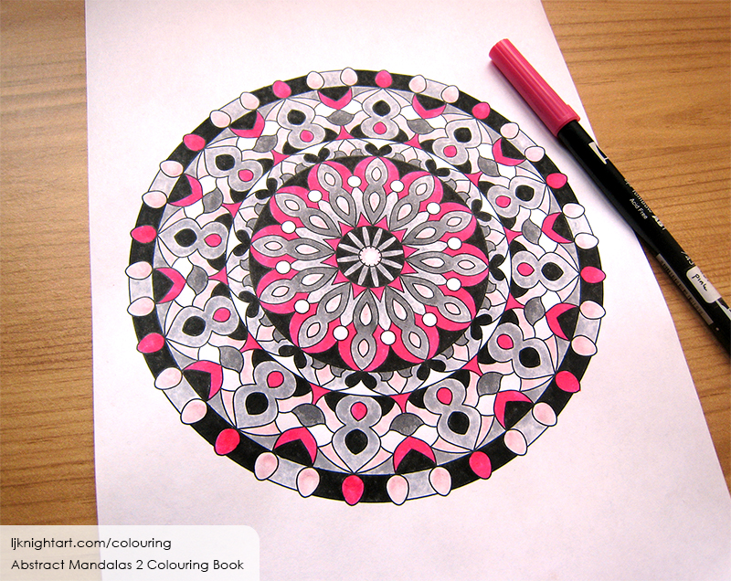 Coloured mandala colouring page