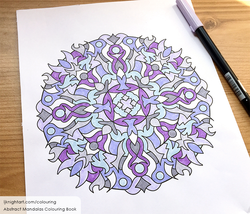 Coloured mandala in purple, grey and white, by L.J. Knight