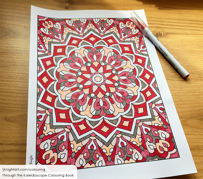 Coloured kaleidoscope mandala in red, peach and grey, by L.J. Knight