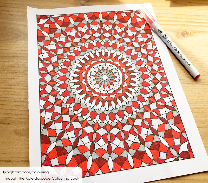Coloured kaleidoscope mandala in red, white and grey, by L.J. Knight