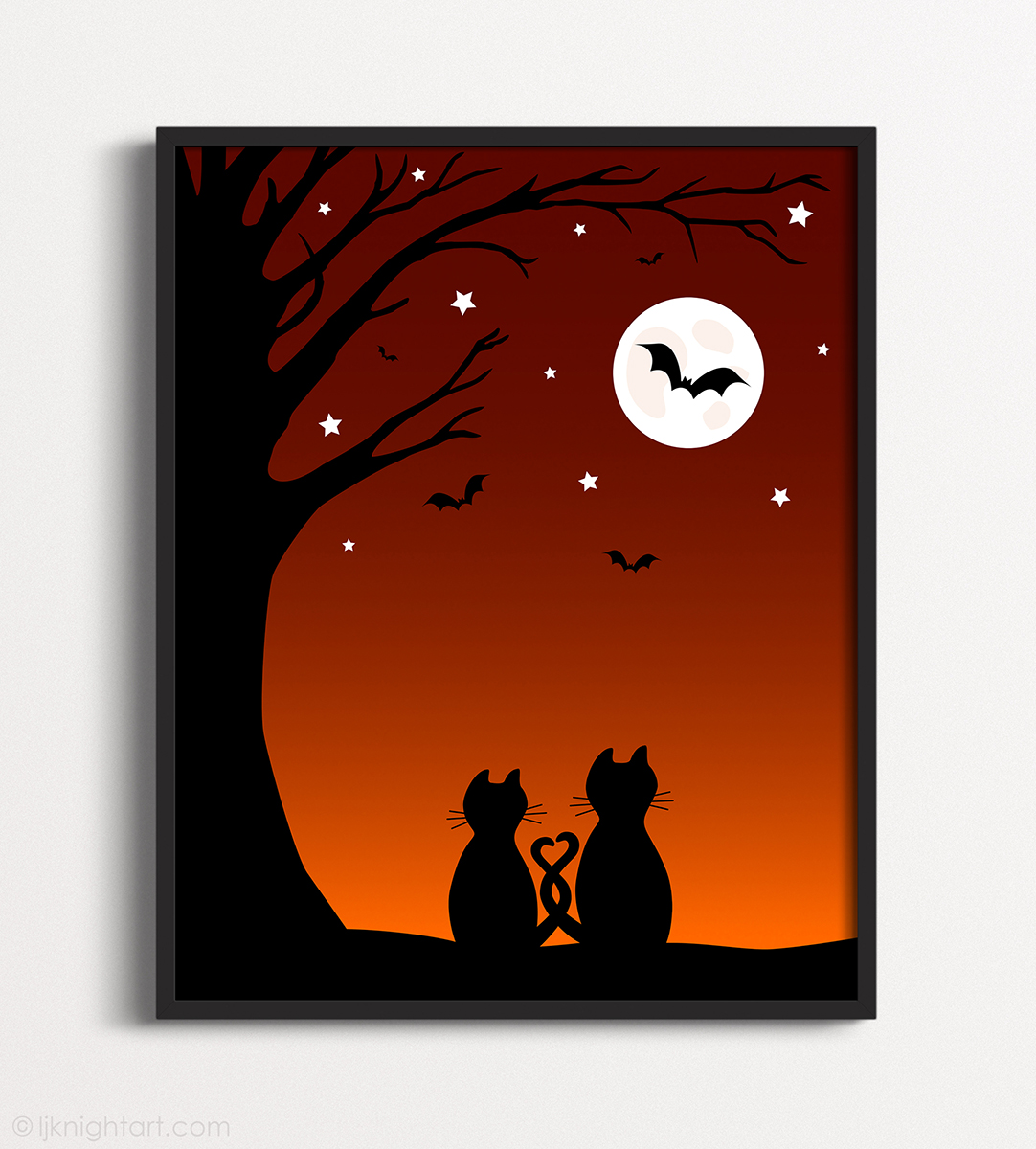 Framed art print with Halloween illustration of a silhouetted cat couple sitting under a tree looking at the moon, with an orange sky and flying bats